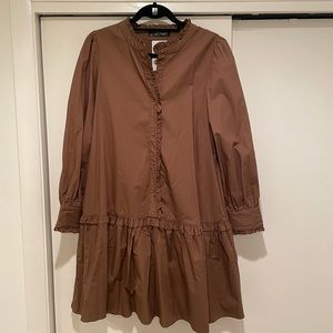 Wade Voss from Monkee’s brown drop waist dress